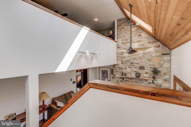 staircase with lofted ceiling and wood ceiling