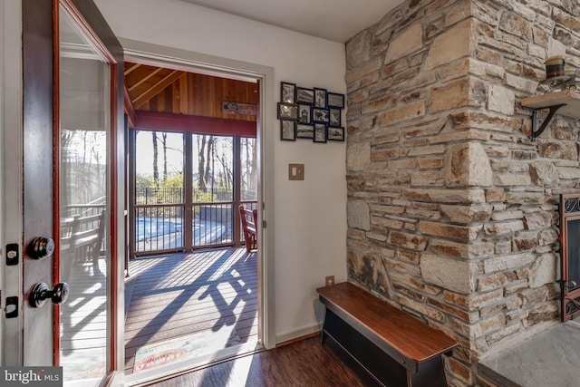 doorway to outside with wood finished floors