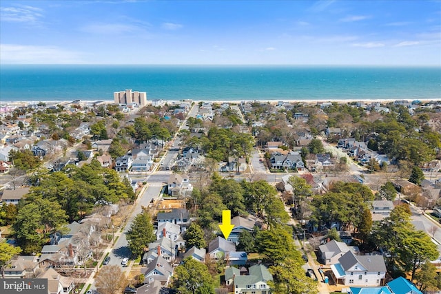 aerial view featuring a water view and a residential view