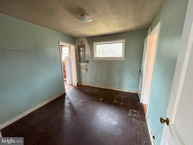 8183 Forest Glen Dr, Pasadena, MD 21122 - empty room with electric panel, baseboards, and gas water heater