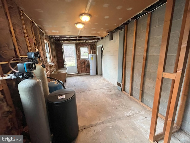 8183 Forest Glen Dr, Pasadena, MD 21122 - misc room with concrete block wall and gas water heater