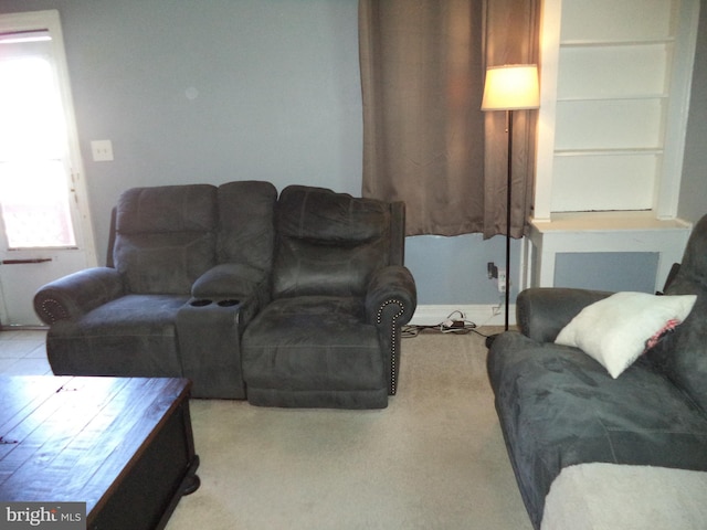 living area with carpet floors