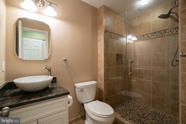 4501 Peppermill Ct, Dumfries, VA 22025 - bathroom with vanity, tiled shower, and toilet