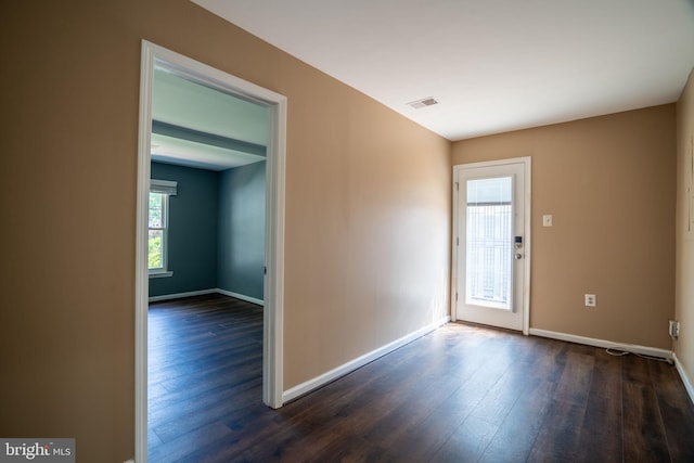 4501 Peppermill Ct, Dumfries, VA 22025 - spare room featuring dark wood-style floors and baseboards