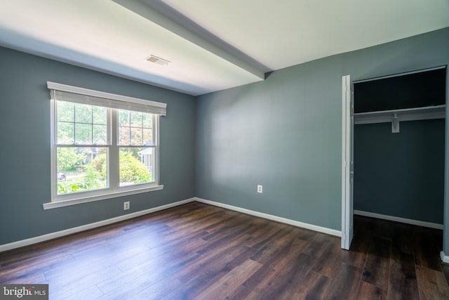 4501 Peppermill Ct, Dumfries, VA 22025 - unfurnished bedroom featuring dark wood finished floors, baseboards, and a closet