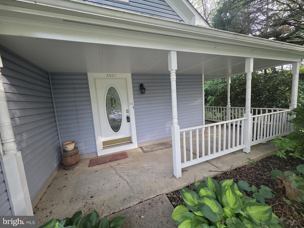 4501 Peppermill Ct, Dumfries, VA 22025 - property entrance with a porch