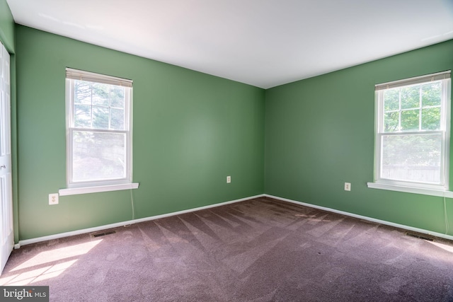 4501 Peppermill Ct, Dumfries, VA 22025 - carpeted empty room featuring plenty of natural light and baseboards