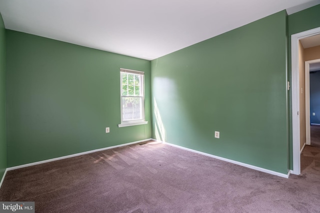 4501 Peppermill Ct, Dumfries, VA 22025 - carpeted empty room with baseboards