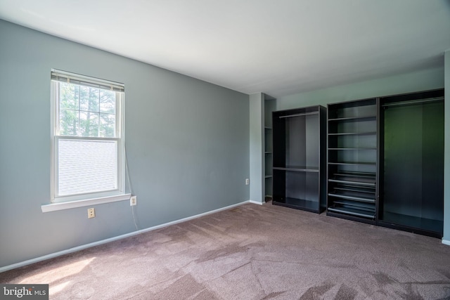 4501 Peppermill Ct, Dumfries, VA 22025 - unfurnished bedroom featuring carpet floors and baseboards