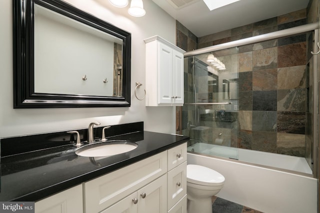 4501 Peppermill Ct, Dumfries, VA 22025 - bathroom featuring vanity, toilet, and bath / shower combo with glass door
