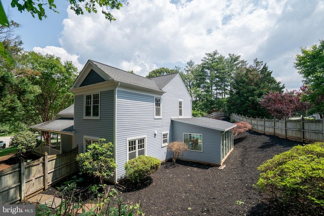 4501 Peppermill Ct, Dumfries, VA 22025 - rear view of property featuring roof with shingles