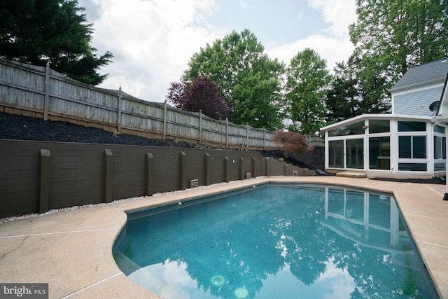 4501 Peppermill Ct, Dumfries, VA 22025 - view of swimming pool featuring a fenced backyard, a sunroom, and a patio