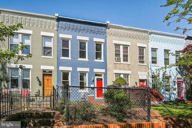 314 14th Pl NE, Washington, DC 20002 - multi unit property with a fenced front yard and brick siding