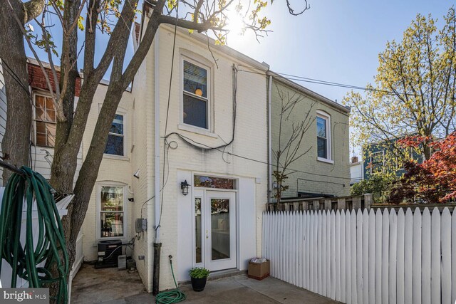 314 14th Pl NE, Washington, DC 20002 - rear view of house with brick siding and fence