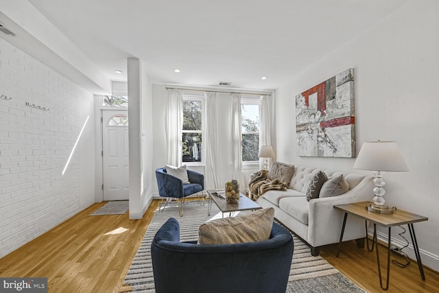 314 14th Pl NE, Washington, DC 20002 - living area featuring brick wall, recessed lighting, light wood finished floors, and visible vents