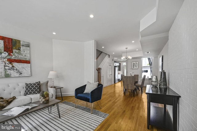 314 14th Pl NE, Washington, DC 20002 - living area with an inviting chandelier, recessed lighting, wood finished floors, stairs, and baseboards