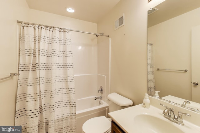 bathroom with toilet, shower / bathtub combination with curtain, vanity, and recessed lighting
