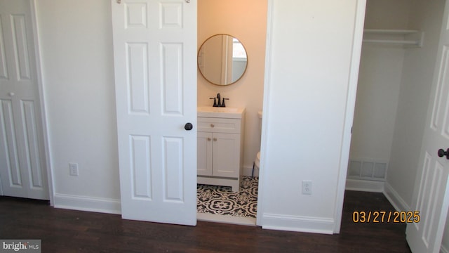 1261 Gallatin St NE, Washington, DC 20017 - interior space with a sink, dark wood-style floors, baseboards, and visible vents