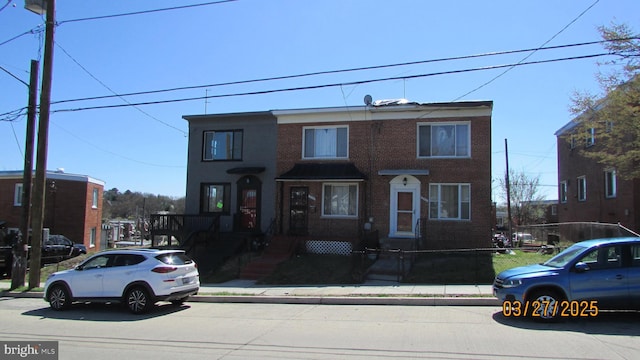 1261 Gallatin St NE, Washington, DC 20017 - view of front of property featuring fence and brick siding
