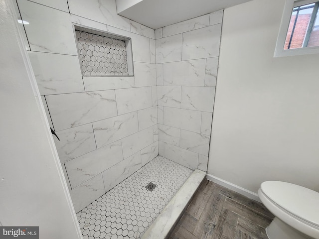 1261 Gallatin St NE, Washington, DC 20017 - bathroom with a stall shower, baseboards, and toilet