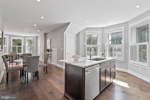 900 11th St NE Unit 1, Washington, DC 20002 - kitchen featuring recessed lighting, dark wood finished floors, stainless steel dishwasher, a sink, and light stone countertops
