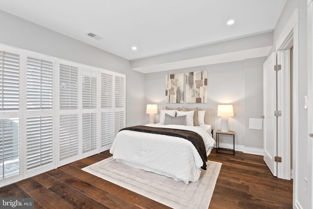900 11th St NE Unit 1, Washington, DC 20002 - bedroom featuring wood finished floors, recessed lighting, baseboards, and visible vents