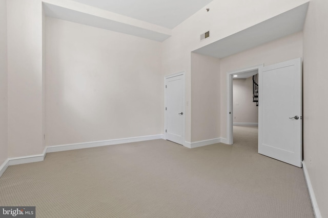 201 N 8th St Unit 105, Philadelphia, PA 19106 - unfurnished room featuring light carpet and baseboards
