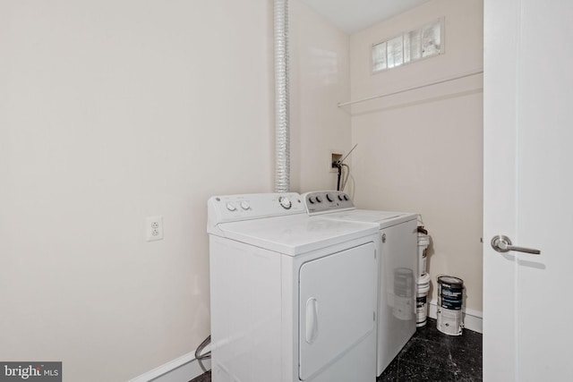 201 N 8th St Unit 105, Philadelphia, PA 19106 - laundry area featuring washer and dryer and baseboards