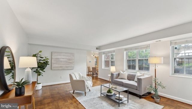 1336 N Ode St Unit 5, Arlington, VA 22209 - living room with a chandelier and baseboards