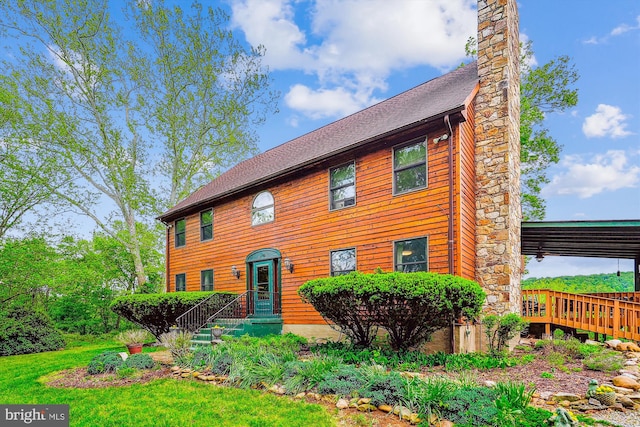 colonial-style house with a chimney