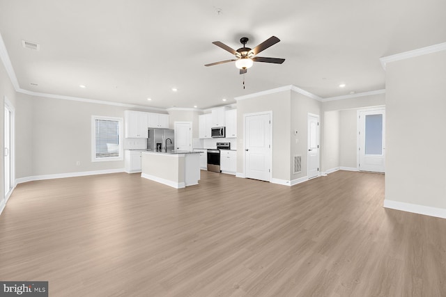 unfurnished living room with baseboards, ceiling fan, visible vents, and light wood-type flooring