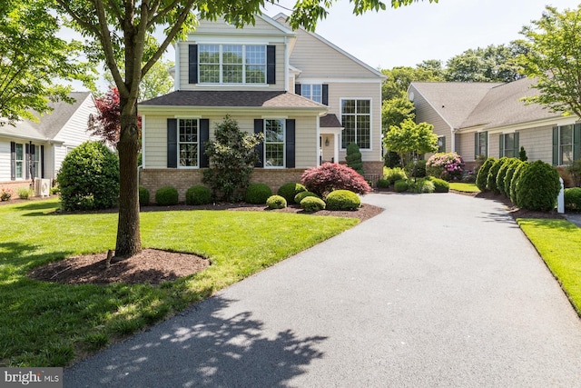 5464 Cherry Hill Ln, Salisbury, MD 21801 - traditional home featuring brick siding and a front lawn