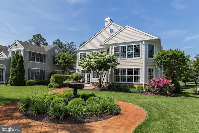 5464 Cherry Hill Ln, Salisbury, MD 21801 - rear view of property featuring a lawn, a chimney, and french doors