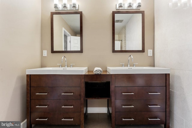 full bathroom with double vanity