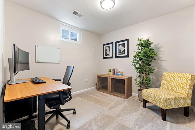 office space featuring carpet floors and baseboards