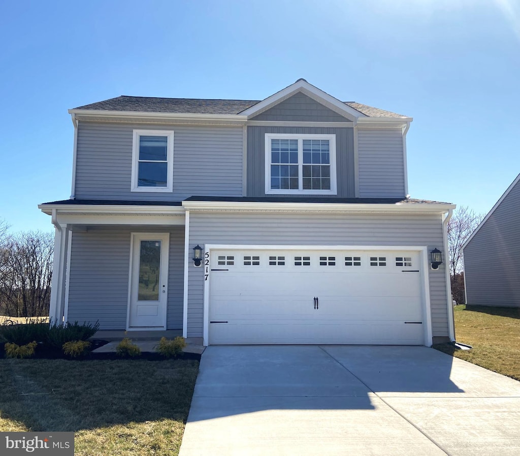 5217 Mccormick Ave, Baltimore, MD 21206 - traditional-style home with driveway and a garage