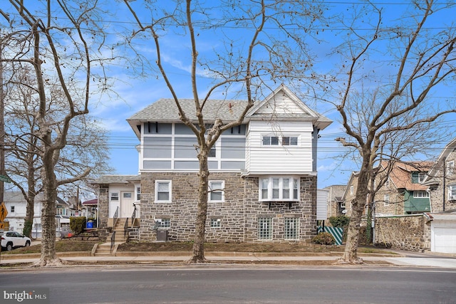 view of front of property with stone siding