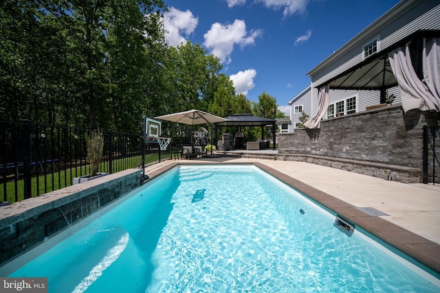 187 Verbena Dr, Stafford, VA 22554 - view of swimming pool featuring a gazebo, fence, and a patio