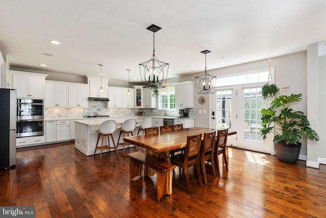 187 Verbena Dr, Stafford, VA 22554 - dining space with dark wood-style floors, recessed lighting, a chandelier, and baseboards