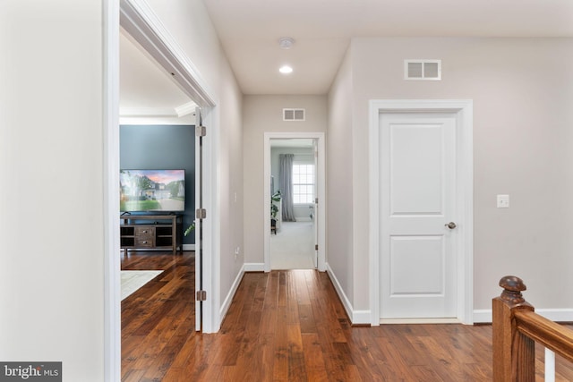187 Verbena Dr, Stafford, VA 22554 - corridor with dark wood-style flooring and baseboards