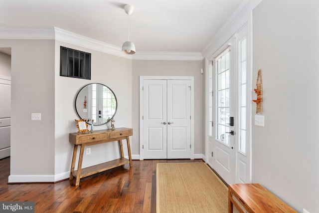 187 Verbena Dr, Stafford, VA 22554 - entryway featuring dark wood-style floors, healthy amount of natural light, baseboards, and crown molding