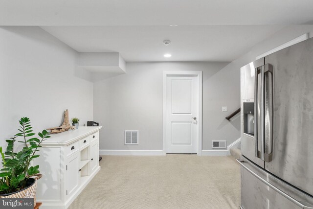 187 Verbena Dr, Stafford, VA 22554 - kitchen with stainless steel fridge, open shelves, light carpet, baseboards, and recessed lighting
