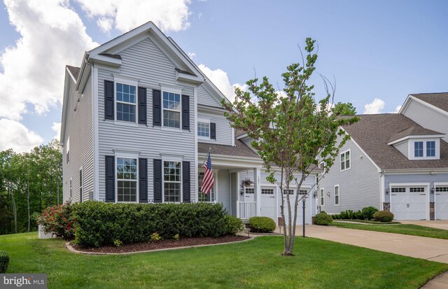 187 Verbena Dr, Stafford, VA 22554 - view of front facade featuring driveway and a front yard
