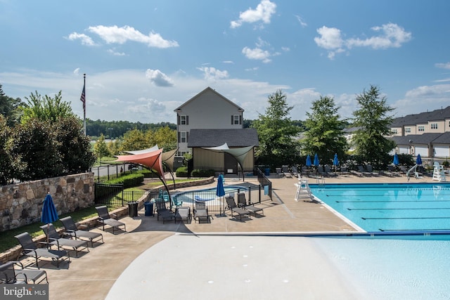187 Verbena Dr, Stafford, VA 22554 - pool featuring a patio and fence