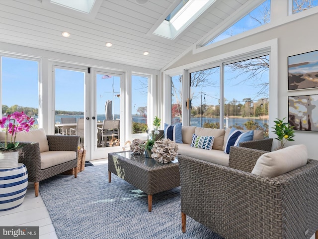 sunroom featuring a water view, recessed lighting, wood ceiling, and lofted ceiling with skylight