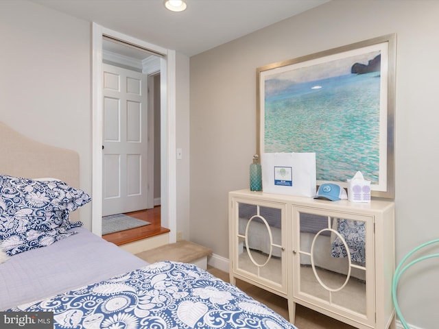 bedroom with recessed lighting and baseboards