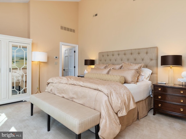 bedroom featuring access to outside, high vaulted ceiling, visible vents, and carpet floors