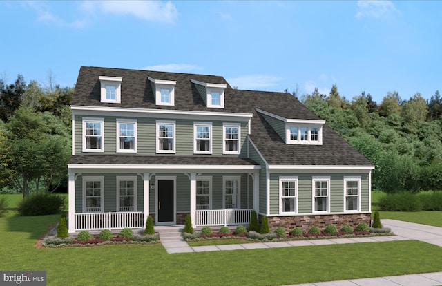 view of front of property featuring covered porch, a front yard, and a shingled roof