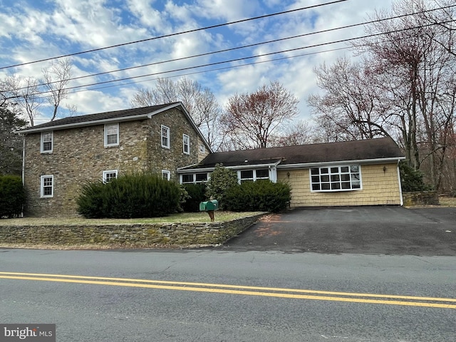 view of front of property with aphalt driveway