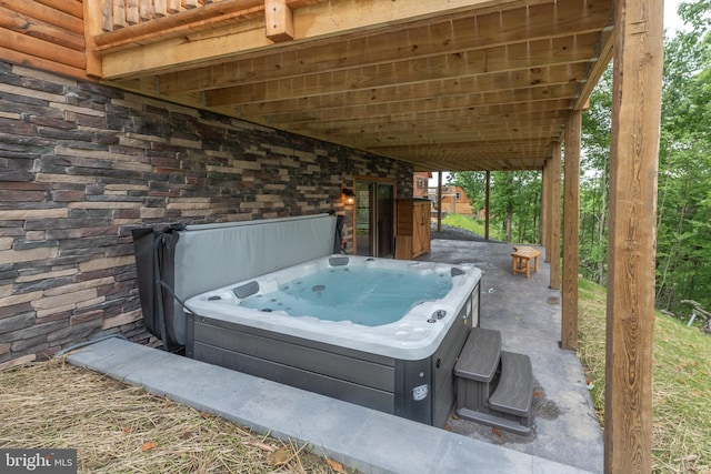 view of patio / terrace featuring a hot tub